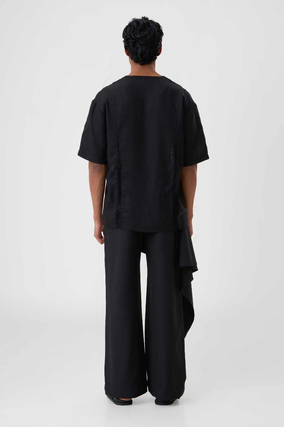 DRAPED TROUSERS
